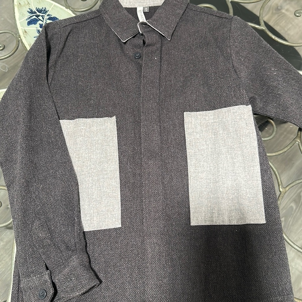 Gray boys button down with gray pockets. Excellent condition.